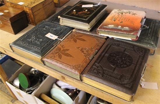 Japanese lacquered photograph album, painted views to interior & 7 other decorative family photograph albums, 19/20C (a.f)